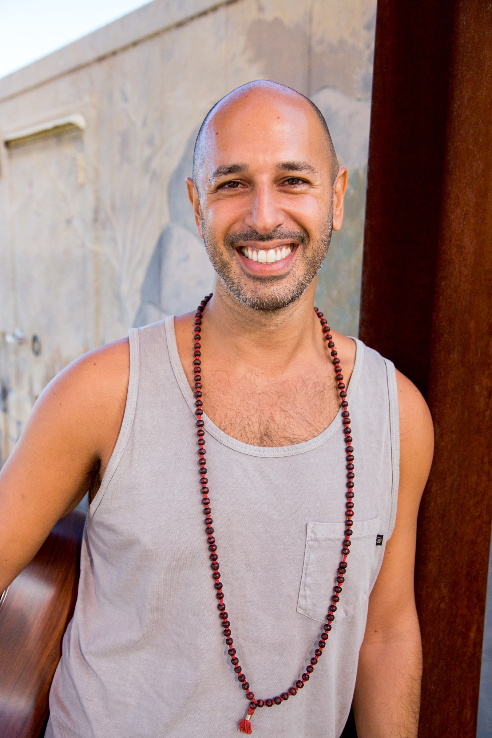 Hamid Jabbar smiling outdoors